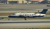 N184UX @ KLAX - Taxiing to gate at LAX - by Todd Royer