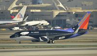 N713SW @ KLAX - Taxiing to gate at LAX - by Todd Royer