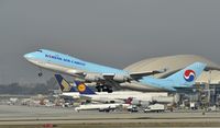 HL7438 @ KLAX - Departing LAX on 25R - by Todd Royer