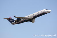 N444ZW @ KSRQ - US Air Flight 4078 oeprated by Air Wisconsin (N444ZW) departs Sarasota-Bradenton International Airport enroute to Reagan National Airport - by Donten Photography