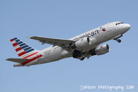 N702UW @ KSRQ - US Air Flight 1801 (N702UW) departs Sarasota-Bradenton International Airport enroute to Charlotte-Douglas International Airport - by Donten Photography