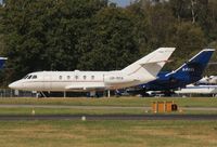 UR-MOA @ EGHH - At Cobham with G-FRAS - by John Coates