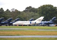 UR-MOA @ EGHH - With the Cobham Falcon 20s - by John Coates