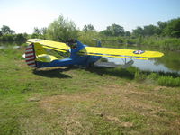 N92KL @ KEDC - Avid Catalina preparing for float test- a stock tank in Texas.
Passed with..flying colors. - by Jack Bell