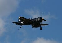 N713JT @ KTIX - Corsair flying at Tico Warbirds Air Show 14 Mar 2014 - by Roy Schering