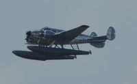 N44573 - Just after takeoff, Lake Weir, Florida. - by G. Eckel