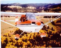 N5066G @ KSPF - N5066G  photo shopped over the Black Hills of SD near KSPF - by Mark Farrier