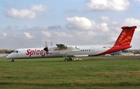 VT-SUF @ EGHH - Taxiing to Signatures - by John Coates