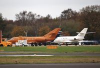 UR-SBS @ EGHH - At Cobham with UR-CLF - by John Coates