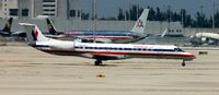 N662EH @ KMIA - American Eagle Embraer EMB-145LR - by Kreg Anderson