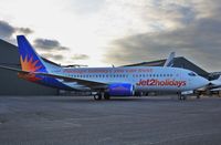 G-GDFK @ EGHH - Just painted to Jet 2 Holidays - by John Coates