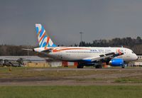 TC-IZA @ EGHH - Arriving for repaint - by John Coates
