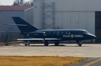 XC-HID @ MMMX - Policia Federal DA20E, photo taken from plane in MEX. - by FerryPNL