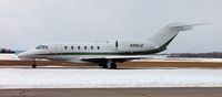 N300JD @ KAXN - Cessna 750 Citation X taxiing out to runway 31 for departure. - by Kreg Anderson