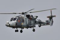 ZZ407 @ EGHH - Low approach - by John Coates