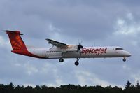 VT-SUI @ EGHH - Dusk arrival for stop on delivery flight - by John Coates