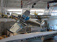 N80518 @ KIAD - Her smooth, shiny skin glistens in America's Hangar. - by Daniel L. Berek