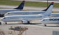 N270PL @ MIA - All white 737-400, no titles going to City Airways Thailand, now with HS-GTC registration