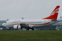 4L-TGI @ LFPG - Boeing 737-505, Reverse thrust landing rwy 26L, Roissy Charles De Gaulle Airport (LFPG-CDG) - by Alexander Todt
