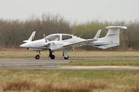 N228US @ EGFH - Visiting Diamond Twin Star arriving Runway 22. - by Roger Winser
