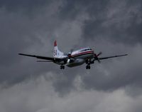 C-FKFM @ CYXX - Landing - by Guy Pambrun