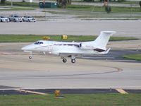 N301TG @ TPA - Embraer Phenom 300