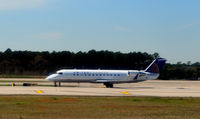N983CA @ KIAH - takeoff Houston - by Ronald Barker