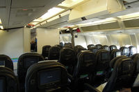 ZK-NCJ @ NZAA - The forward Y cabin, at the early stages of boarding for the flight to HNL - by Micha Lueck