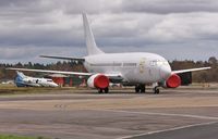 EI-FDE @ EGHH - ex LN-BUD in storage - by John Coates