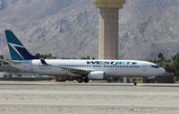 C-GKWA @ KPSP - Boeing 737-800 - by Mark Pasqualino