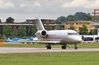 OE-INM @ EGLF - Taxiing to depart - by John Coates