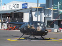 ZK-HEI - At harbour heliport - by magnaman