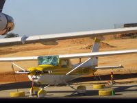 CS-AYR @ LPFR - CS-AYR  Cessna152 sat under the wing of 9Q-CMC - by Guitarist