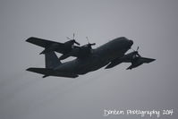 64-14863 @ KSRQ - USAF C-130 (64-14863) from Pope Air Force Base perfoms a touch and go at Sarasota-Bradenton International Airport - by Donten Photography