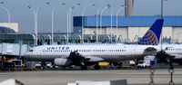 N444UA @ KORD - Gate C21 Chicago - by Ronald Barker