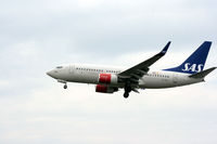SE-REY @ EKCH - SE-REY about to land on rw 22L - by Erik Oxtorp