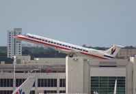 N610AE @ MIA - Eagle ERJ-145 - by Florida Metal