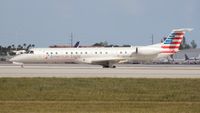 N668HH @ MIA - Eagle E145LR - by Florida Metal