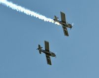 G-VFDS @ EGFH - With smoke on leading G-EGRV. In Team Raven formation aerobatic display team markings. - by Roger Winser