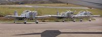 G-CIBM @ EGFH - Line up of three Team Raven aircraft, G-CIBM, G-EGRV and G-VFDS. The full team will consist of of five Vans aircraft. - by Roger Winser