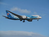 B-2727 @ NZAA - Landing at AKL - from viewing area - by magnaman