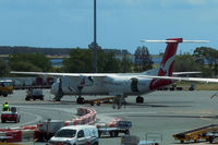 VH-QOU @ YBBN - At Brisbane - by Micha Lueck