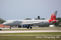 N605JB @ KSRQ - JetBlue Flight 741 (N605JB) Boston Red Sox arrives at Sarasota-Bradenton International Airport following a flight from Boston-Logan International Airport - by Donten Photography