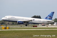 N606JB @ KSRQ - JetBlue Flight 164 (N606JB) Idlewild Blue departs Sarasota-Bradenton International Airport enroute to John F Kennedy International Airport - by Donten Photography
