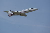 N116AS @ KLUK - Learjet 24 Blasting off from KLUK - by Charlie Pyles