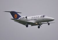 D-ILHE @ EGHH - Approach to 08 in the rain - by John Coates