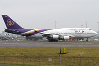 HS-TGX @ YSSY - taxiing off 34L - by Bill Mallinson