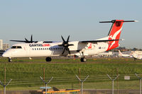 VH-QOT @ YSSY - taxiing to 34R - by Bill Mallinson