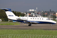 N692BE @ YSSY - taxiing from 34R - by Bill Mallinson