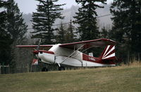 C-GOOJ @ CAV3 - Tied down on the grass at 100 Mile House, BC, in April, with a light snow falling. - by Murray Lundberg
